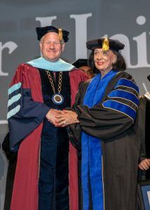 Faulkner University President Mike Williams presents Jere Lynn Burkhart with the degree of Doctor of Humane Letters at the university's Annual Benefit Dinner featuring Tony Blair at the Renaissance Hotel in downtown Montgomery on Oct. 4, 2018