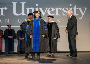 Faulkner University President Mike Williams presents Jere Lynn Burkhart with the degree of Doctor of Humane Letters at the university's Annual Benefit Dinner featuring Tony Blair at the Renaissance Hotel in downtown Montgomery on Oct. 4, 2018