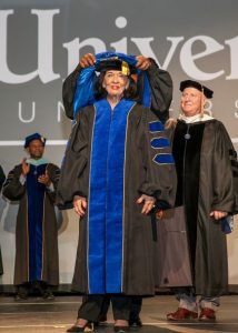 Faulkner University President Mike Williams presents Jere Lynn Burkhart with the degree of Doctor of Humane Letters at the university's Annual Benefit Dinner featuring Tony Blair at the Renaissance Hotel in downtown Montgomery on Oct. 4, 2018