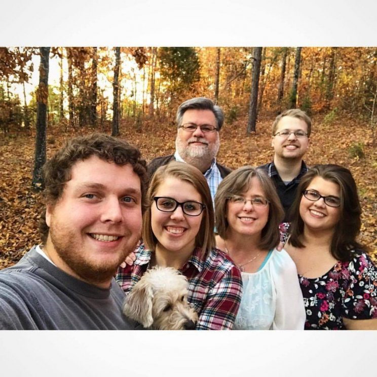 Mark and Ramona Martin pose with their children, Seth, Rebekah and Rachel and son-in-law, Rett Russell.