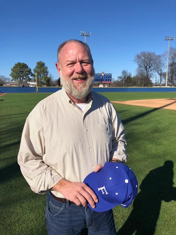 David Noles holds a Faulkner baseball camp on the field.