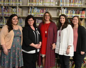 Julie Powell, second from the right, stands among fellow graduates (l-r) Amanda Greene, Jeannie Allen, Britney Fureigh and Kimberly Griggs.