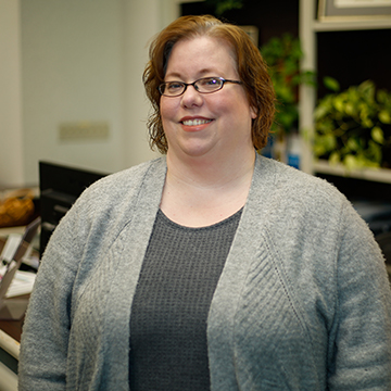 Circulation Manager Mary Hodge Posing for Photo