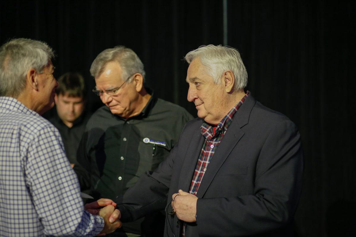 Author, Joe Beam, right, stands with a group of men. 