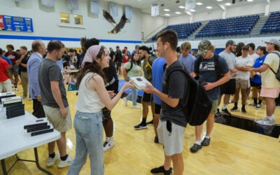 Churches Join Together To Give Every Student A Bible