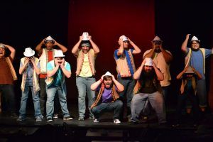 Hunter Lee Smith, center and other students and faculty from Faulkner perform in the Faulkner Dinner Theater's last show, Joseph and the Amazing Technicolor Dreamcoat.