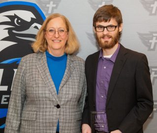 Christopher Smith, right, stands with Dr. Susan Hammond.