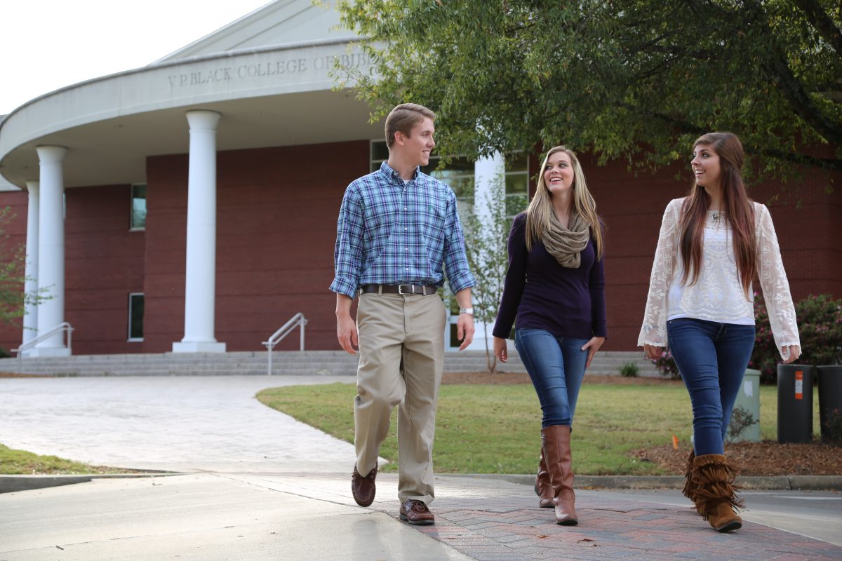 Student walk outside Faulkner's VP Black College of Biblical Studies building. Faulkner just announced it will offer tradition undergraduate Bible majors full tuition.