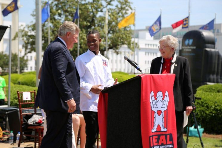 Future Eagle, Antoine Tatum, center was awarded Faulkner's first HEAL Scholarship by President Mike Williams and honored as a HEAL Hero by Gov. Kay Ivey on the inaugural HEAL Day at the Alabama Capitol.