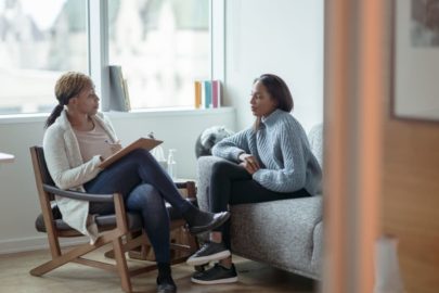 A counselor and a client talk