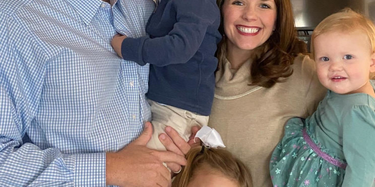 Left, Aaron Greenwood poses with his wife Lindsey (Irwin) Greenwood and three children, Brooklyn, Houston and Eliza.
