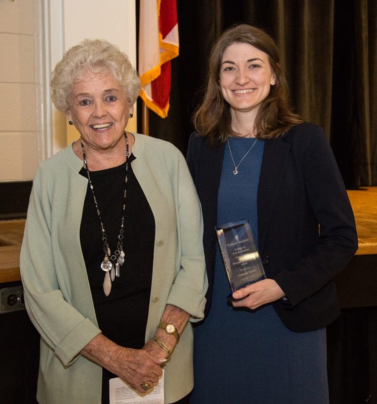 Distinguished Alumna Amanda Eakin, right, stands with professor Joan Waters, Ph.D.