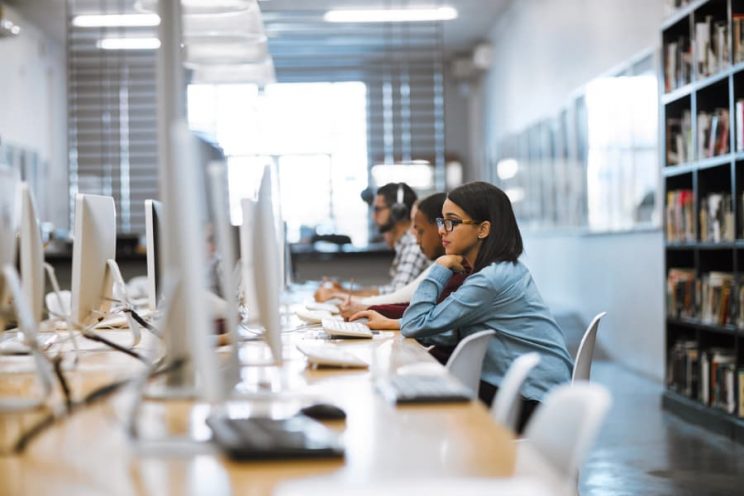 Students at computers in a classroom