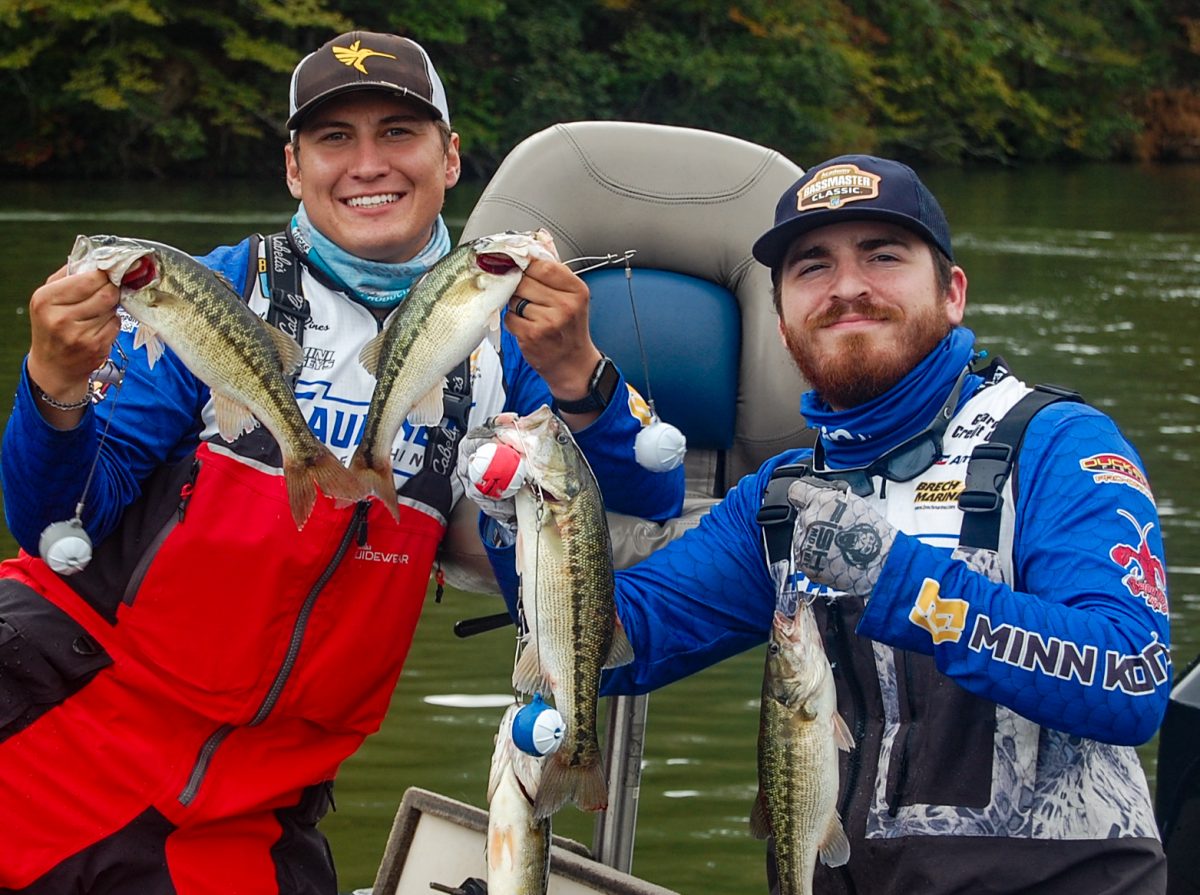 Christian Rines, left and Ben Garcia pose with their bass.