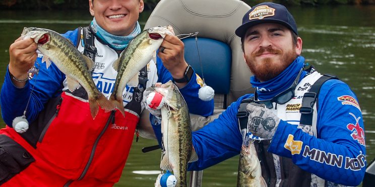 Christian Rines, left and Ben Garcia pose with their bass.