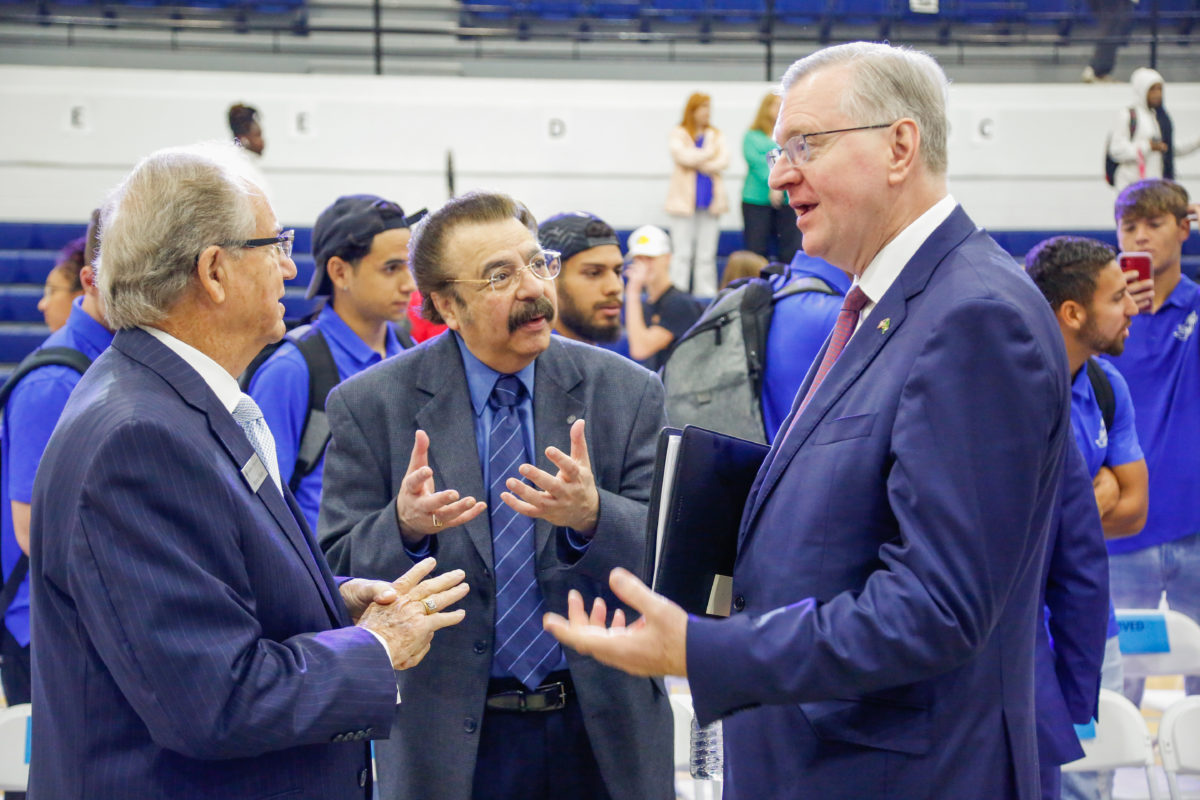 r-l Ambassador of Brazil to the USA Nestor Forster, Jr. speaks to Dean of the Harris College of Business and Executive Education, Dave Khadanga and Vice Chancellor Wayne Baker during his visit August 25, 2022.