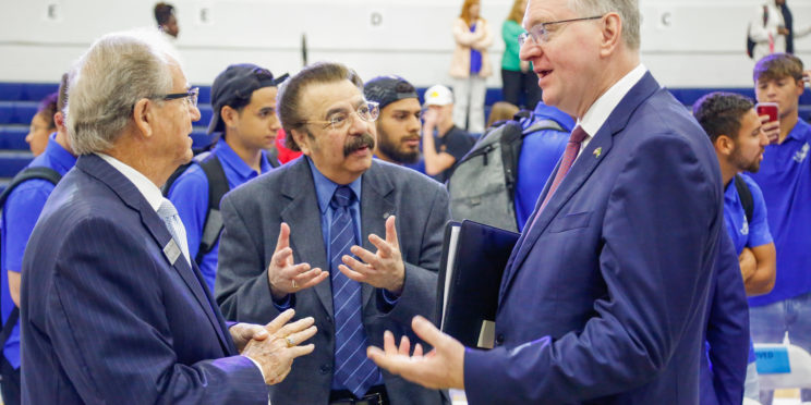 r-l Ambassador of Brazil to the USA Nestor Forster, Jr. speaks to Dean of the Harris College of Business and Executive Education, Dave Khadanga and Vice Chancellor Wayne Baker during his visit August 25, 2022.