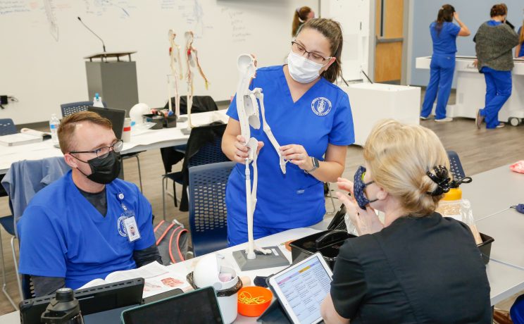 College of Health students conduct class in one of the new labs.