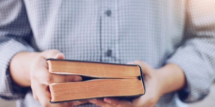 Man holding Bible