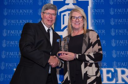 Christine Wiggins is awarded the Accomplished Alumna Award at the 2025 Marketplace Faith Friday Forums.
