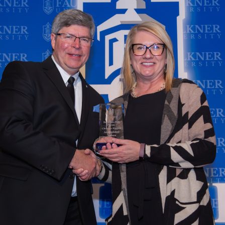 Christine Wiggins is awarded the Accomplished Alumna Award at the 2025 Marketplace Faith Friday Forums.