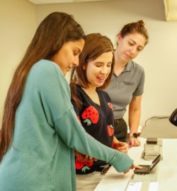 Students in the Criminal Justice Department practice fingerprinting as they train to become law enforcement officers.