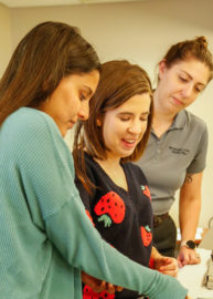 Students in the Criminal Justice Department practice fingerprinting.