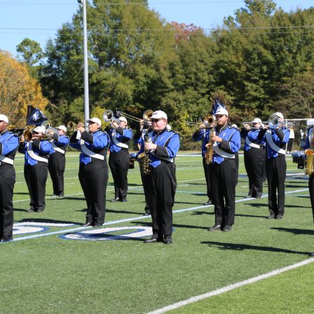Students with the "Marching Eagles" band perform at halftime during the 2025 Homecoming Game.