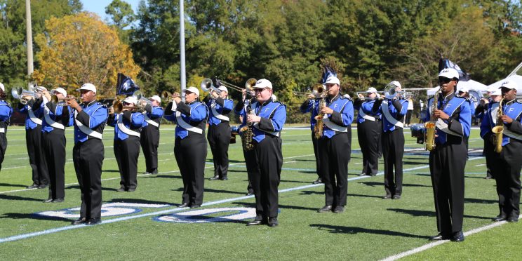 Students with the "Marching Eagles" band perform at halftime during the 2025 Homecoming Game.