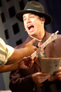 Daniel Monplaisir plays one of the leads in Faulkner Dinner Theater's play, Guys and Dolls.