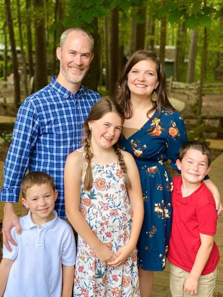 Rick Williams poses with his wife, Brooke and their three children. Williams works as an optometrist in Leeds, Alabama.