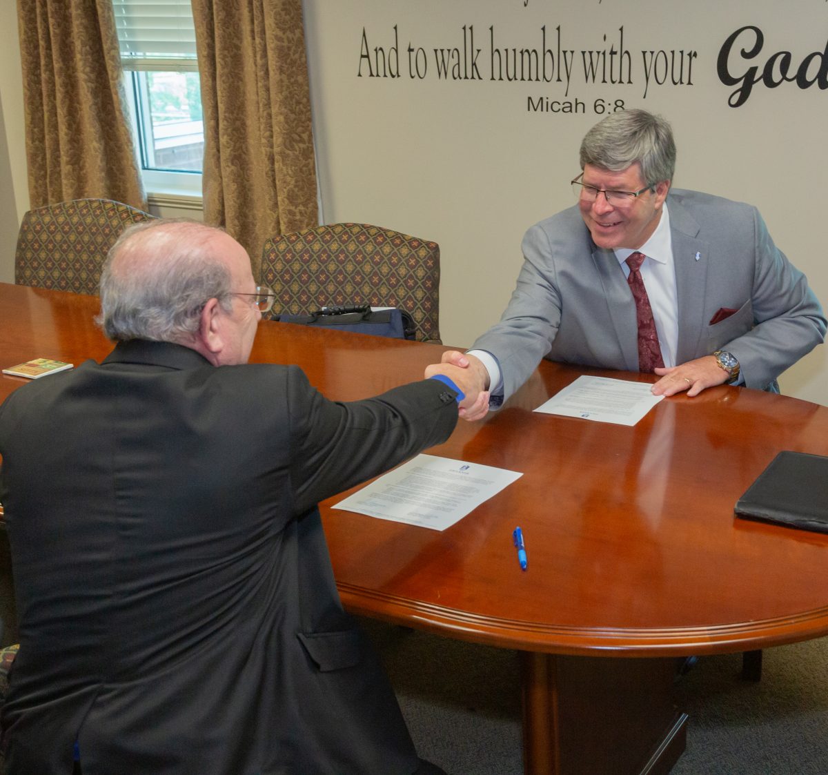 Presidents with Bear Valley and Faulkner sign agreement. 