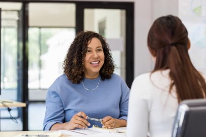 Human resources manager meeting a new employee