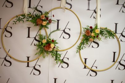 Three Golden Hoops with Flower Arrangements