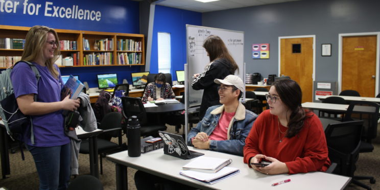 l-r Certified student tutors Emily Gilbert, Megan Wilkinson, Sam Moore and Sydney Watson gather in the ACE in Brooks Hall.