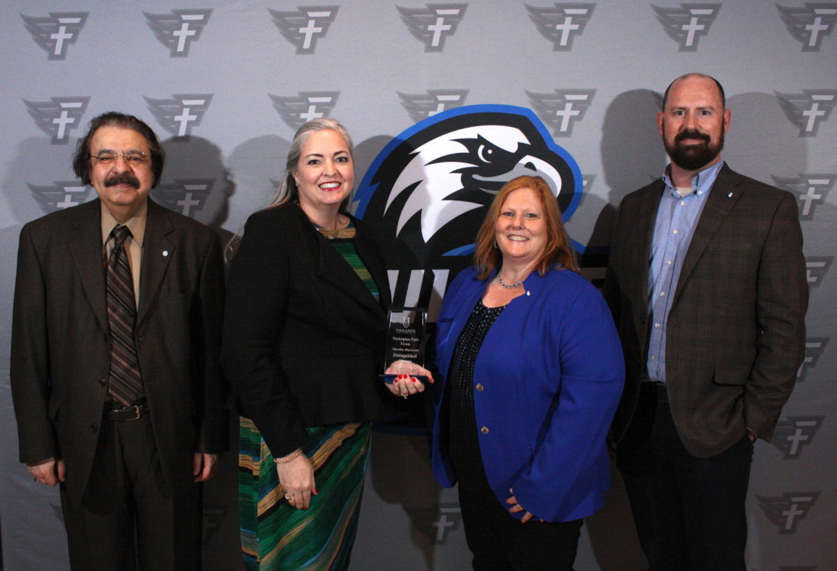 l-r l-r Dave Khadanga, Martha Burleson, Rayla Black and Justin Bond presents Martha Burleson with her Distinguished Alumna Award for the 2023 Marketplace Faith Friday Forums. 