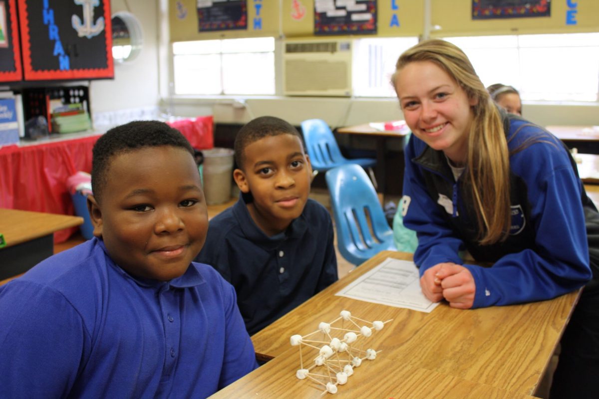 Faulkner students teach children at Davis. 