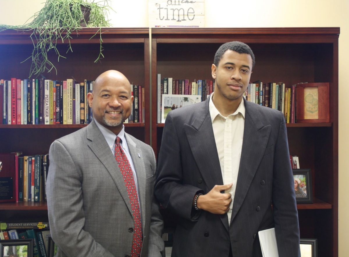 Jacob Hartsfield, right, stands with Dr. Jean-Noel Thompson