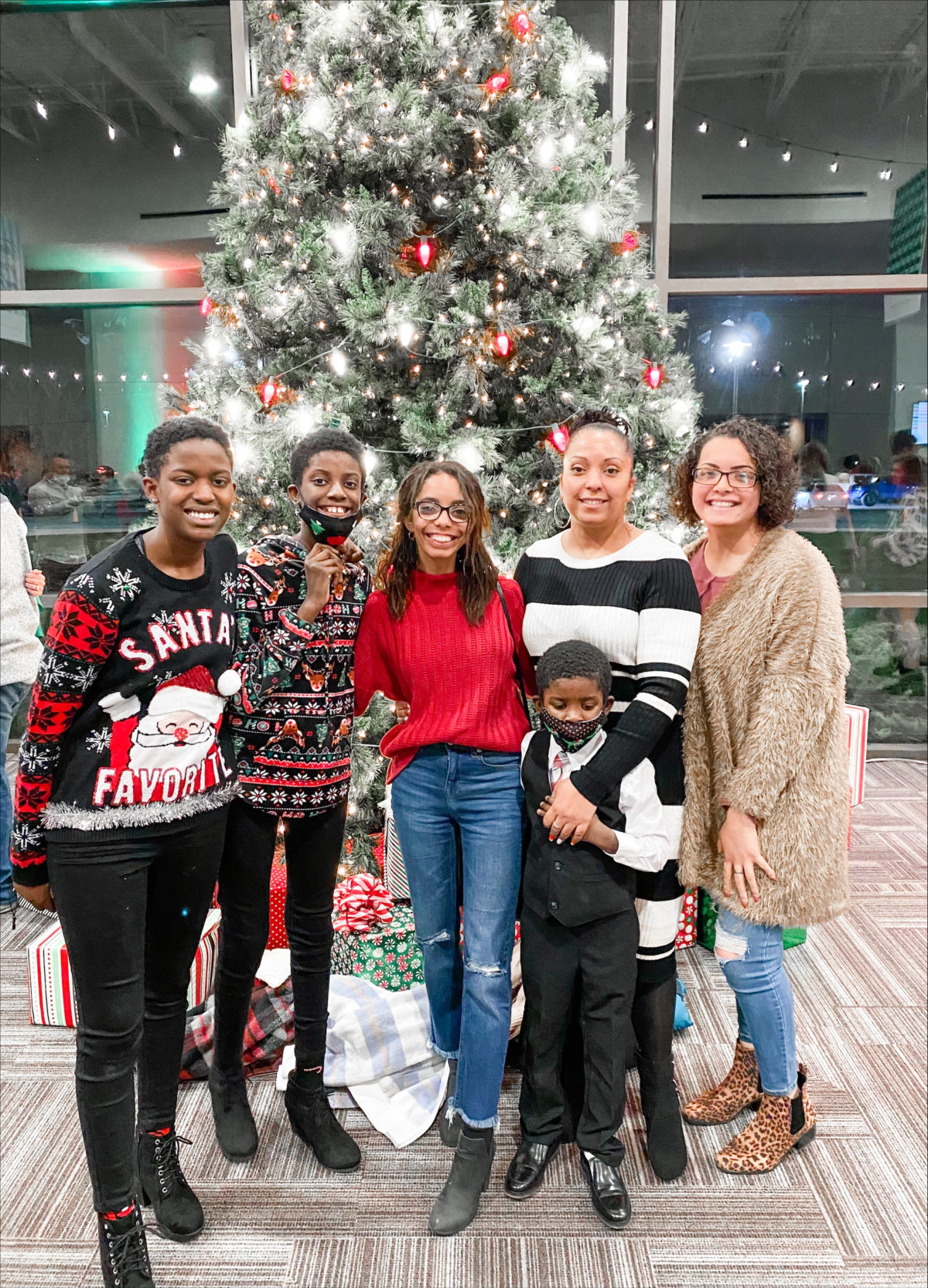 Nayla Contreras, center, poses with her family at Christmas. 