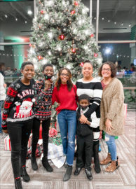 Nayla Contreras, center, poses with her family at Christmas.