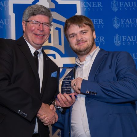 Josh Guy is awarded Accomplished Alumnus during the 2025 Marketplace Faith Friday Forums.