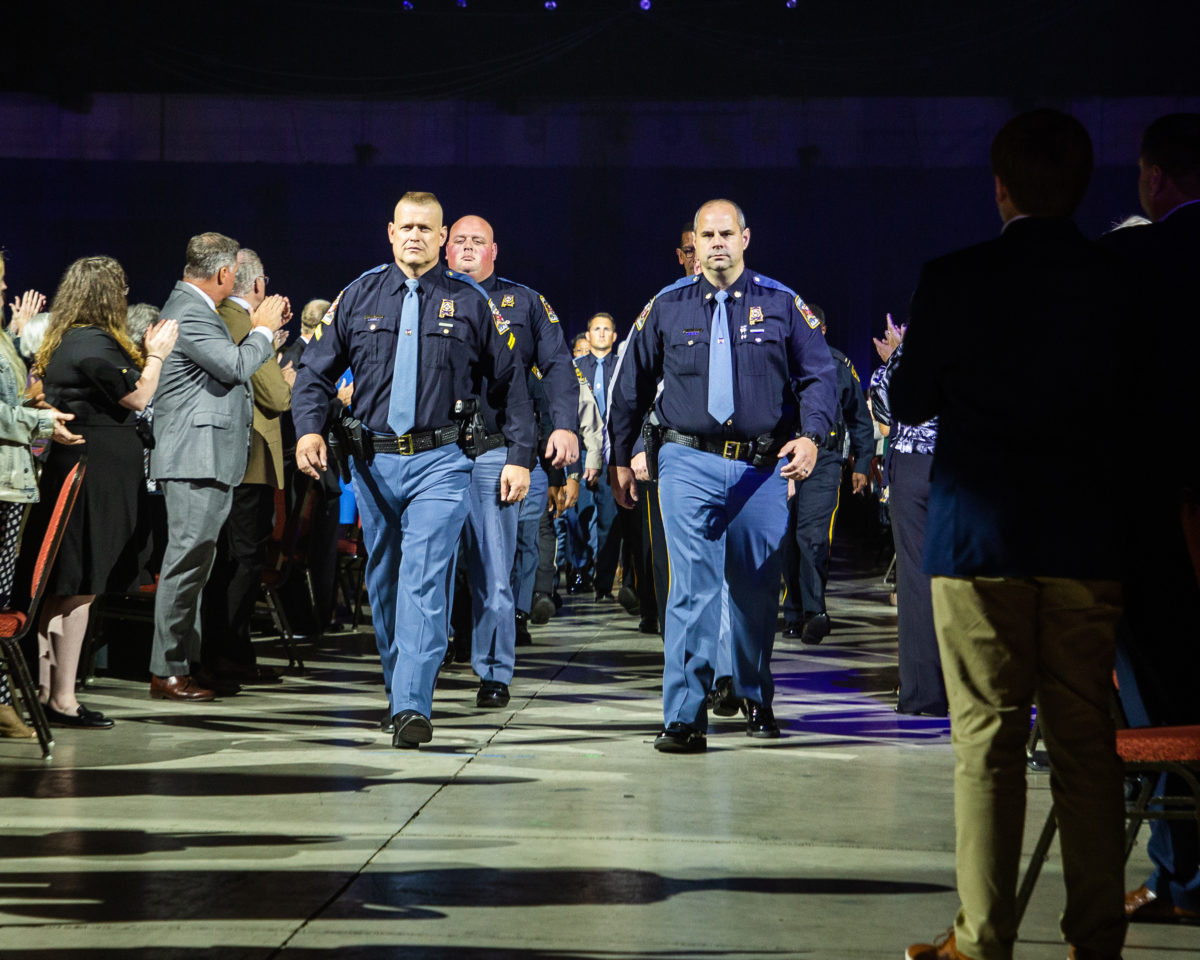 More than 150 law enforcement officers participate in the Walk of Honor during the 2022 Benefit Dinner. 
