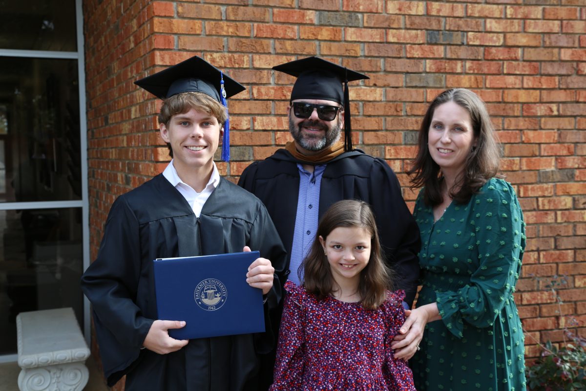 l-r Karson Oakley, left with his parents Kasey and Jessica and sister, Audrey after the graduation ceremony. 