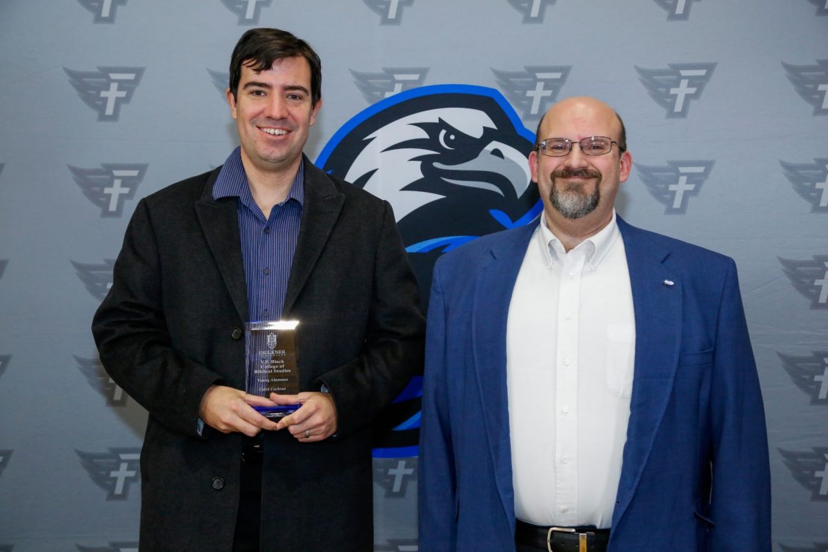 Caleb Cochran and Dr. Todd Brenneman. Cochran is awarded the Young Alumnus Award for the VP Black College of Biblical Studies. Cochran pursued a life in ministry thanks to his professors and classes at Faulkner.