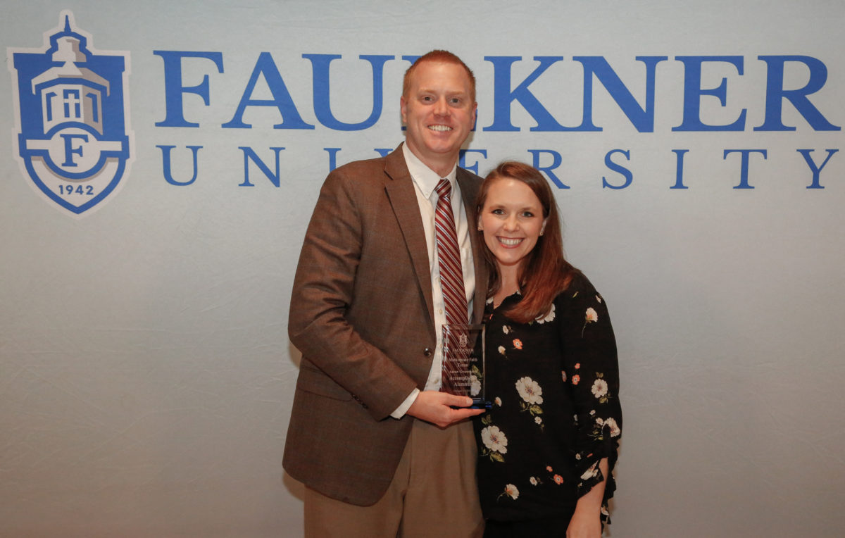 Aaron Greenwood and wife Lindsey pose together after Faulkner's Marketplace Faith Friday Forums. 