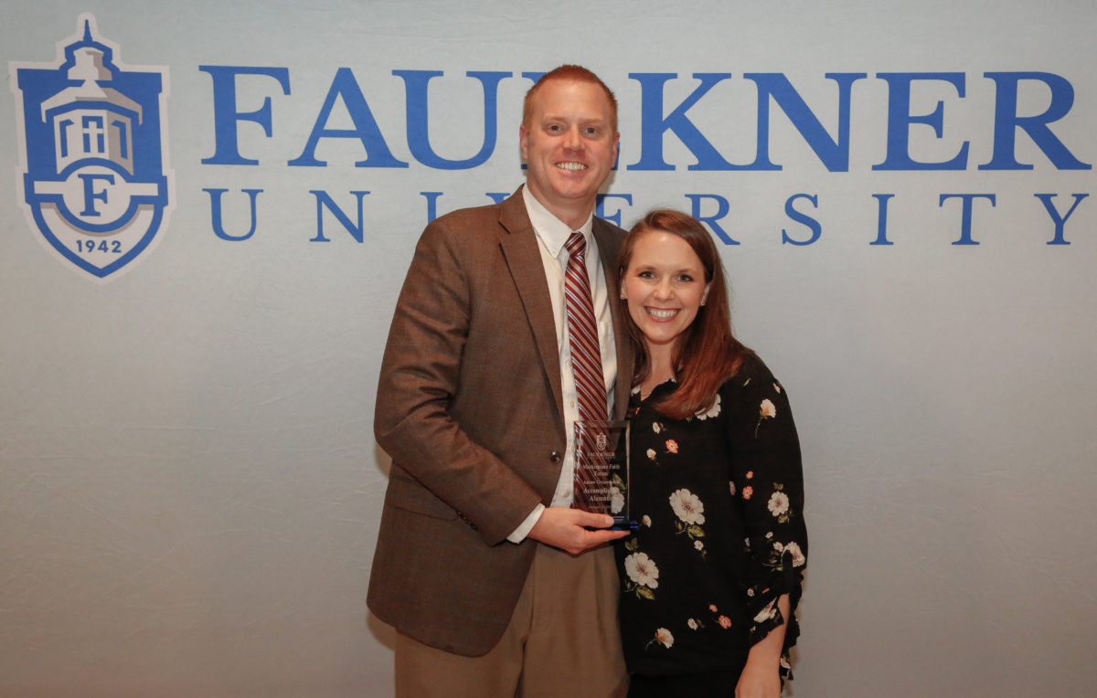 Aaron Greenwood and his wife Lindsey pose together after Faulkner's Marketplace Faith Friday forums. 