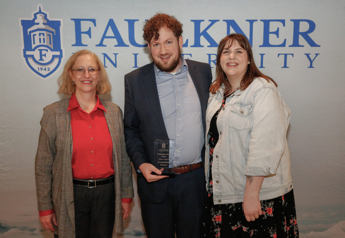 Center, Ethan Widen stands with his wife, Sarah, right, and Dr. Susan Hammond, left.