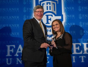 l-r President Mitch Henry presents Mary Lawless Jones with the Distinguished Alumna Award.