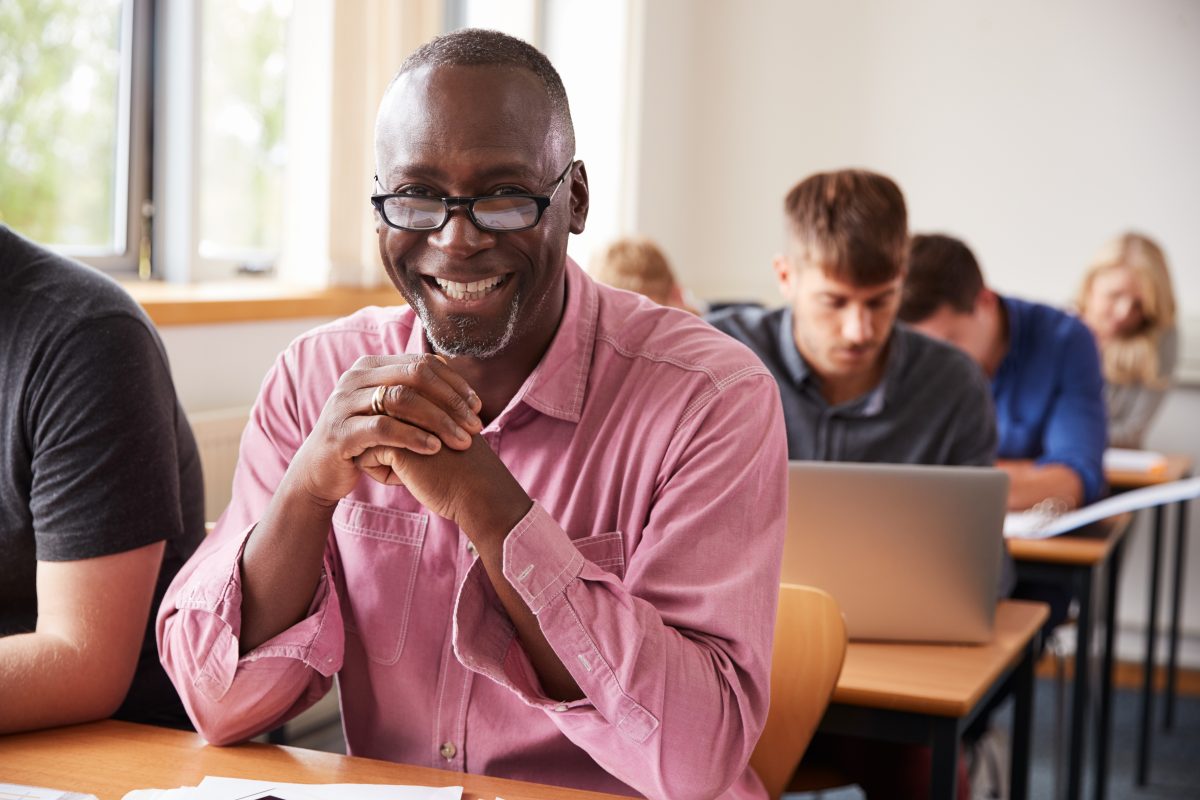 Man in classroom.