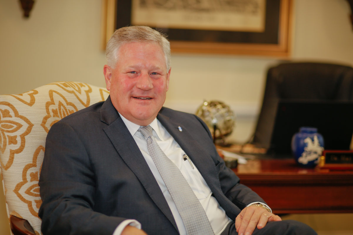 President Mike Williams sits in his office.